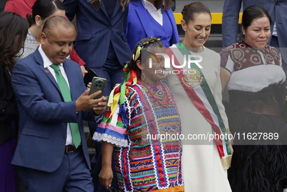 Claudia Sheinbaum, president of Mexico, greets supporters in Mexico City, Mexico, on October 1, 2024, at the Chamber of Deputies after recei...