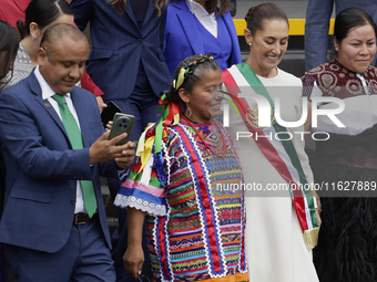 Claudia Sheinbaum, president of Mexico, greets supporters in Mexico City, Mexico, on October 1, 2024, at the Chamber of Deputies after recei...