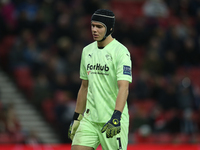 Derby County goalkeeper Jacob Widell Zetterstrom shows dejection while wearing head protection during the Sky Bet Championship match between...