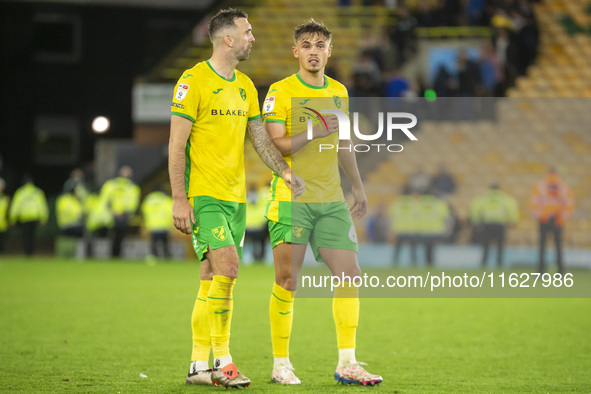 Callum Doyle of Norwich City interacts with Shane Duffy of Norwich City after the Sky Bet Championship match between Norwich City and Leeds...