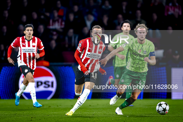 PSV Eindhoven forward Noa Lang and Sporting Club Portugal midfielder Morten Hjulmand during the match PSV vs. Sporting CP at the Philips Sta...