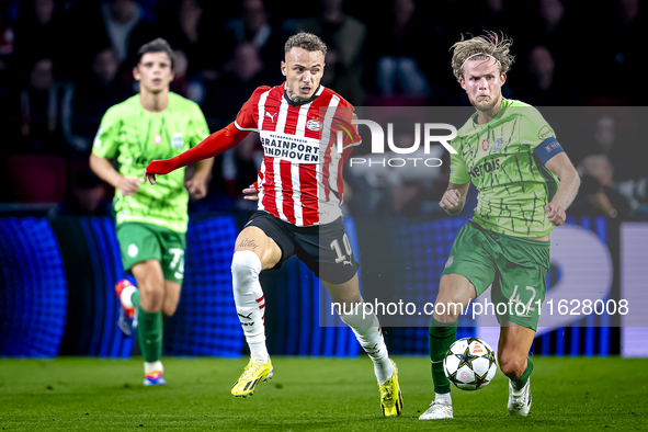 PSV Eindhoven forward Noa Lang and Sporting Club Portugal midfielder Morten Hjulmand during the match PSV vs. Sporting CP at the Philips Sta...