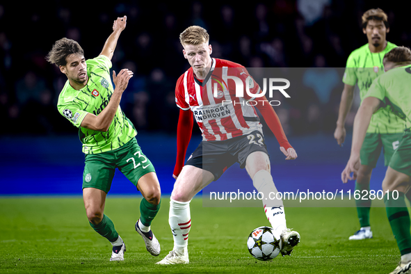 Sporting Club Portugal midfielder Daniel Braganca and PSV Eindhoven midfielder Jerdy Schouten play during the match PSV vs. Sporting CP at t...