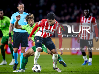 Sporting Club Portugal midfielder Hidemasa Morita and PSV Eindhoven midfielder Malik Tillman during the match PSV vs. Sporting CP at the Phi...