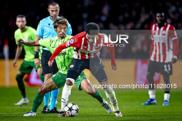 Sporting Club Portugal midfielder Hidemasa Morita and PSV Eindhoven midfielder Malik Tillman during the match PSV vs. Sporting CP at the Phi...