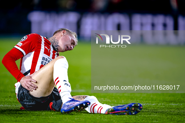 PSV Eindhoven defender Rick Karsdorp gets injured during the match between PSV and Sporting CP at the Philips Stadium for the UEFA Champions...