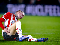 PSV Eindhoven defender Rick Karsdorp gets injured during the match between PSV and Sporting CP at the Philips Stadium for the UEFA Champions...