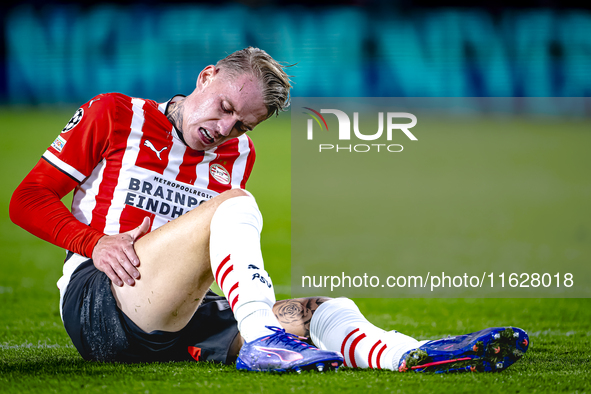 PSV Eindhoven defender Rick Karsdorp gets injured during the match PSV - Sporting CP at the Philips Stadium for the UEFA Champions League ph...