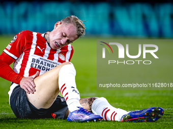 PSV Eindhoven defender Rick Karsdorp gets injured during the match PSV - Sporting CP at the Philips Stadium for the UEFA Champions League ph...