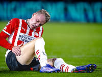 PSV Eindhoven defender Rick Karsdorp gets injured during the match PSV - Sporting CP at the Philips Stadium for the UEFA Champions League ph...