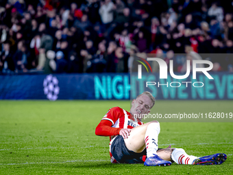 PSV Eindhoven defender Rick Karsdorp gets injured during the match PSV - Sporting CP at the Philips Stadium for the UEFA Champions League ph...