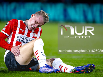 PSV Eindhoven defender Rick Karsdorp gets injured during the match between PSV and Sporting CP at the Philips Stadium for the UEFA Champions...