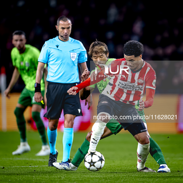 Sporting Club Portugal midfielder Hidemasa Morita and PSV Eindhoven midfielder Malik Tillman during the match PSV vs. Sporting CP at the Phi...