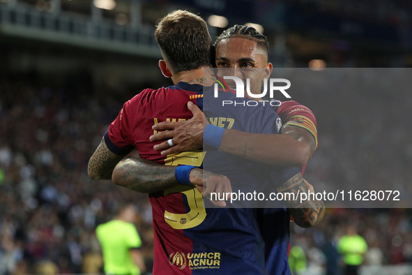 Inigo Martinez and Raphinha Dias celebrate a goal during the match between FC Barcelona and BSC Young Boys in the week 2 of the League Stage...