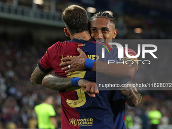 Inigo Martinez and Raphinha Dias celebrate a goal during the match between FC Barcelona and BSC Young Boys in the week 2 of the League Stage...