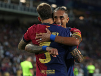 Inigo Martinez and Raphinha Dias celebrate a goal during the match between FC Barcelona and BSC Young Boys in the week 2 of the League Stage...