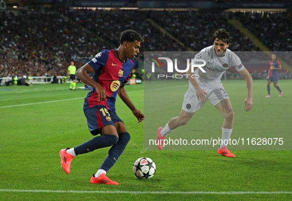 Lamine Yamal and Jaouen Hadjam play during the match between FC Barcelona and BSC Young Boys in the week 2 of the League Stage of the UEFA C...