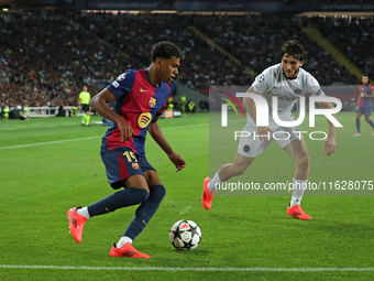 Lamine Yamal and Jaouen Hadjam play during the match between FC Barcelona and BSC Young Boys in the week 2 of the League Stage of the UEFA C...