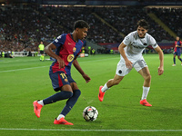 Lamine Yamal and Jaouen Hadjam play during the match between FC Barcelona and BSC Young Boys in the week 2 of the League Stage of the UEFA C...