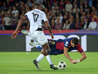 Robert Lewandowski and Mohamed Camara play during the match between FC Barcelona and BSC Young Boys in the week 2 of the League Stage of the...