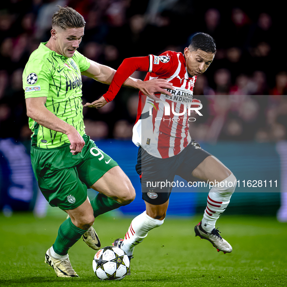 Sporting Club Portugal forward Viktor Gyokeres and PSV Eindhoven defender Mauro Junior during the match PSV vs. Sporting CP at the Philips S...