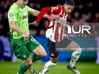 Sporting Club Portugal forward Viktor Gyokeres and PSV Eindhoven defender Mauro Junior during the match PSV vs. Sporting CP at the Philips S...