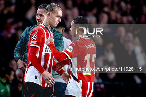 PSV Eindhoven defender Rick Karsdorp and PSV Eindhoven defender Mauro Junior during the match PSV - Sporting CP at the Philips Stadium for t...