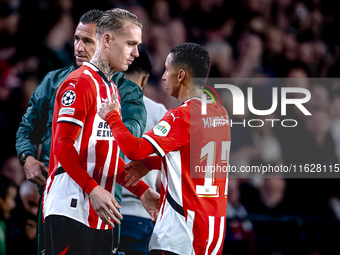 PSV Eindhoven defender Rick Karsdorp and PSV Eindhoven defender Mauro Junior during the match PSV - Sporting CP at the Philips Stadium for t...