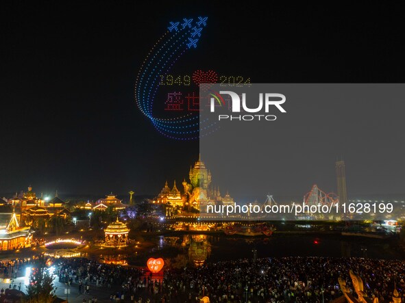 A drone performance is held at the West Tour Park in Huai'an, China, on October 1, 2024. 