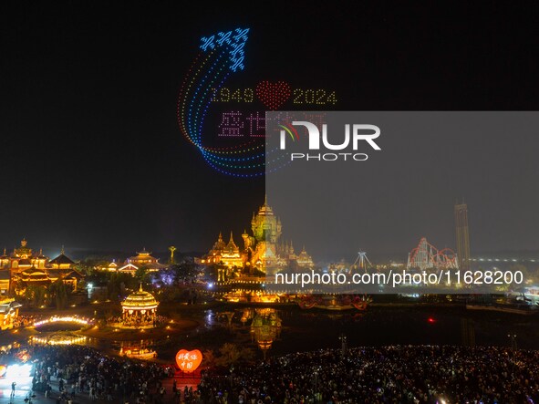 A drone performance is held at the West Tour Park in Huai'an, China, on October 1, 2024. 