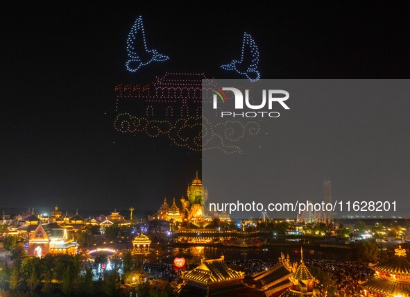 A drone performance is held at the West Tour Park in Huai'an, China, on October 1, 2024. 