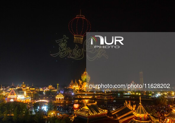 A drone performance is held at the West Tour Park in Huai'an, China, on October 1, 2024. 