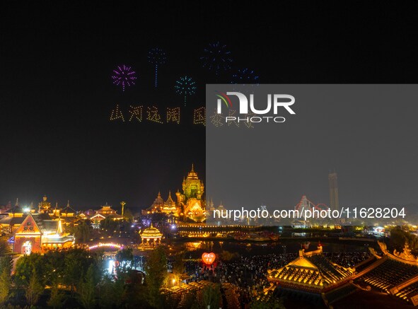 A drone performance is held at the West Tour Park in Huai'an, China, on October 1, 2024. 