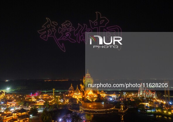 A drone performance is held at the West Tour Park in Huai'an, China, on October 1, 2024. 