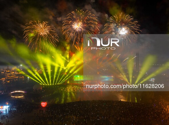 A fireworks show is held at the West Tour Park in Huai'an, China, on October 1, 2024. 