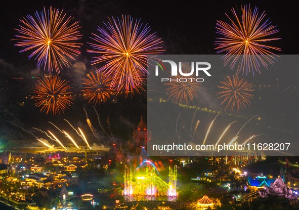 A fireworks show is held at the West Tour Park in Huai'an, China, on October 1, 2024. 