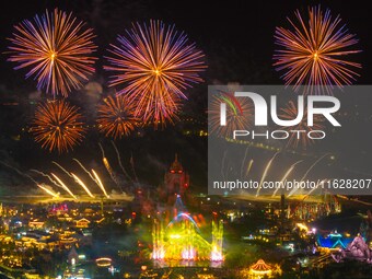 A fireworks show is held at the West Tour Park in Huai'an, China, on October 1, 2024. (