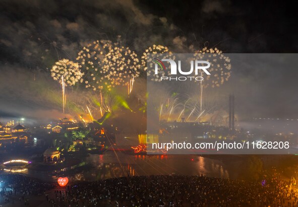 A fireworks show is held at the West Tour Park in Huai'an, China, on October 1, 2024. 