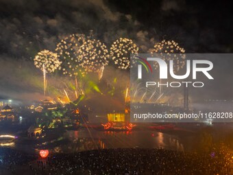 A fireworks show is held at the West Tour Park in Huai'an, China, on October 1, 2024. (