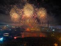 A fireworks show is held at the West Tour Park in Huai'an, China, on October 1, 2024. (