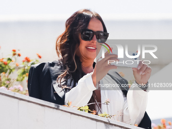 Karla Sofia Gascon arrives at the photocall of Emilia Perez in Cannes, France, on May 19, 2024, during the 77th Festival de Cannes (