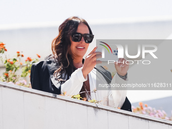 Karla Sofia Gascon arrives at the photocall of Emilia Perez in Cannes, France, on May 19, 2024, during the 77th Festival de Cannes (