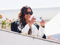 Karla Sofia Gascon arrives at the photocall of Emilia Perez in Cannes, France, on May 19, 2024, during the 77th Festival de Cannes (