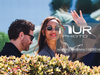 Zoe Saldana arrives at the photocall of Emilia Perez in Cannes, France, on May 19, 2024, during the 77th Festival de Cannes (