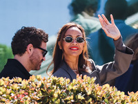 Zoe Saldana arrives at the photocall of Emilia Perez in Cannes, France, on May 19, 2024, during the 77th Festival de Cannes (