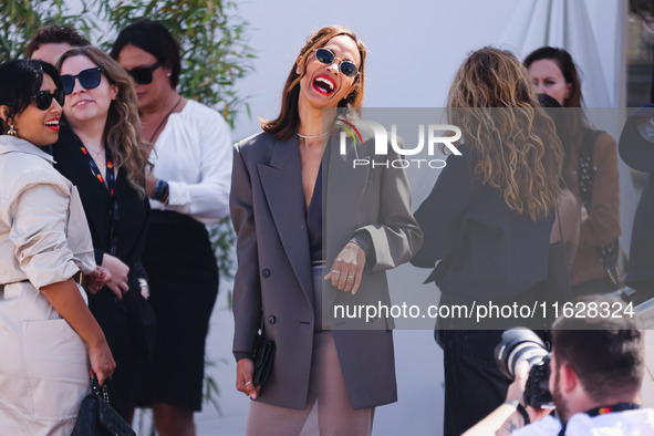 Zoe Saldana arrives at the photocall of Emilia Perez in Cannes, France, on May 19, 2024, during the 77th Festival de Cannes 