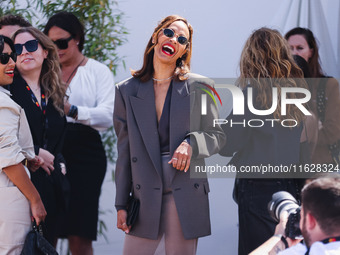 Zoe Saldana arrives at the photocall of Emilia Perez in Cannes, France, on May 19, 2024, during the 77th Festival de Cannes (