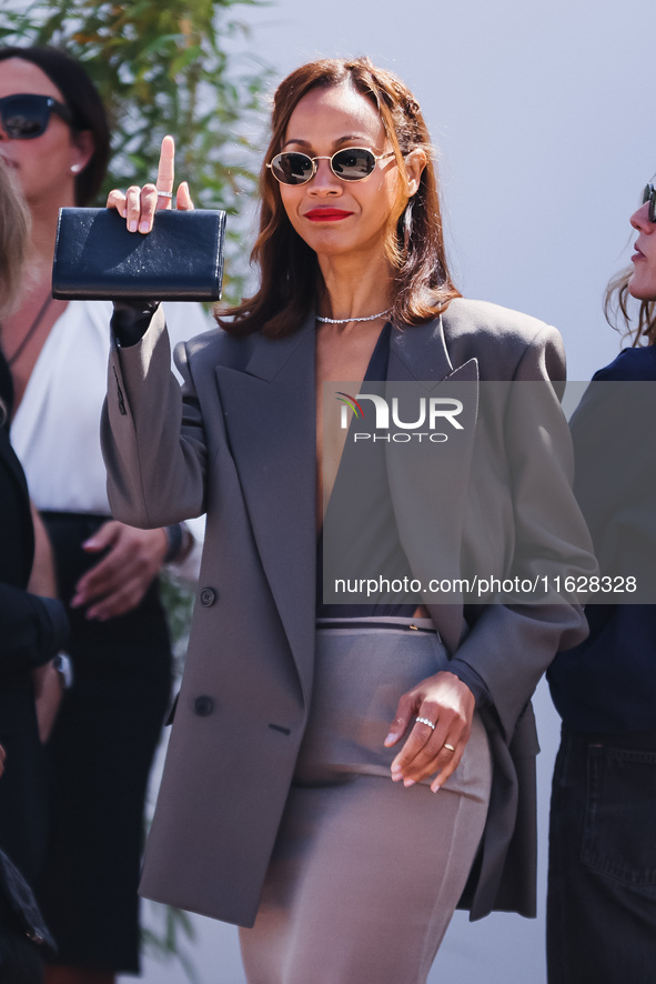 Zoe Saldana arrives at the photocall of Emilia Perez in Cannes, France, on May 19, 2024, during the 77th Festival de Cannes 