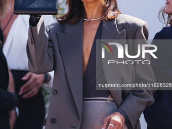 Zoe Saldana arrives at the photocall of Emilia Perez in Cannes, France, on May 19, 2024, during the 77th Festival de Cannes (