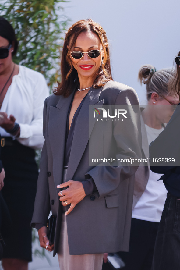 Zoe Saldana arrives at the photocall of Emilia Perez in Cannes, France, on May 19, 2024, during the 77th Festival de Cannes 